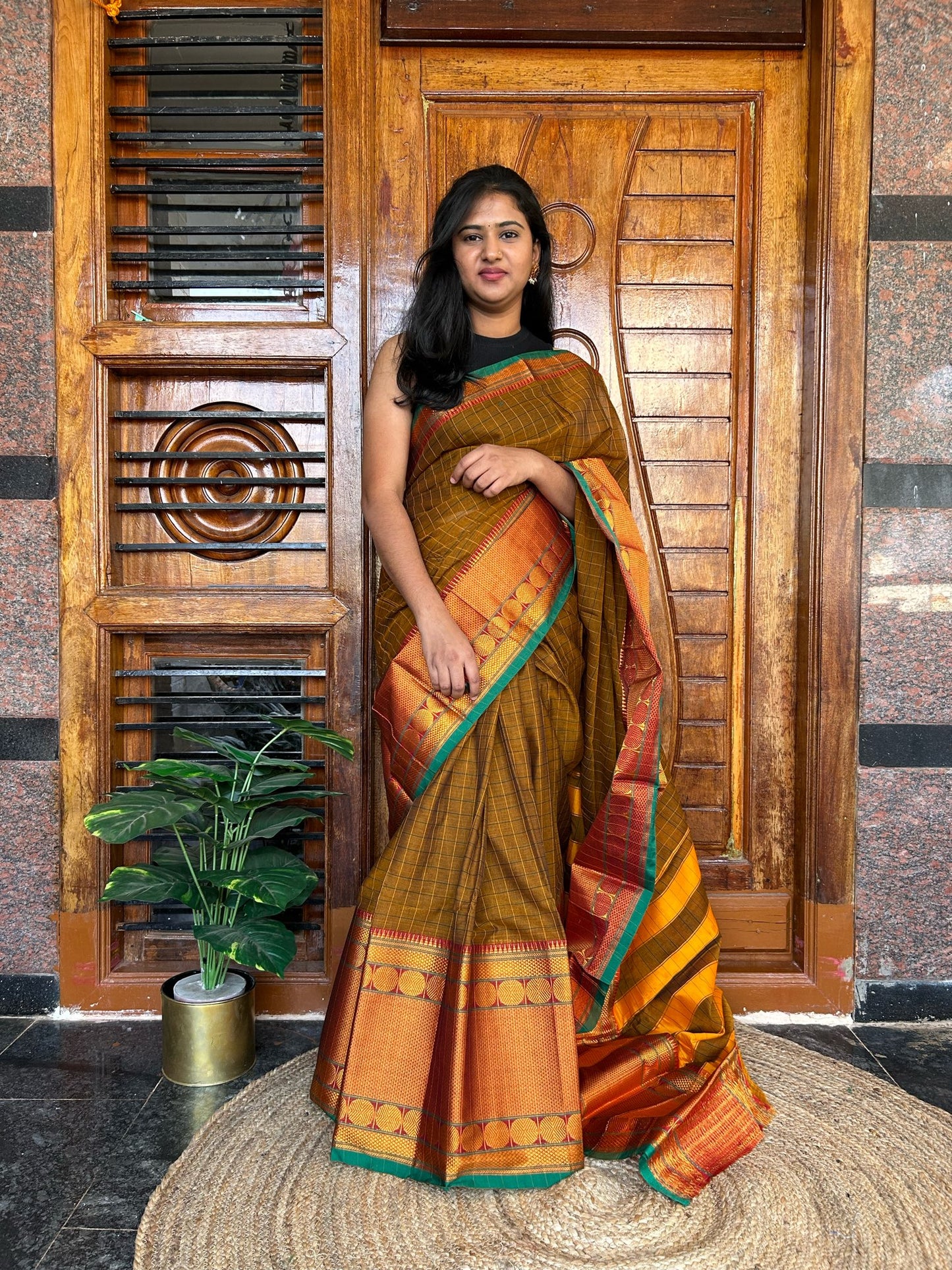 Brown Narayanpet saree.