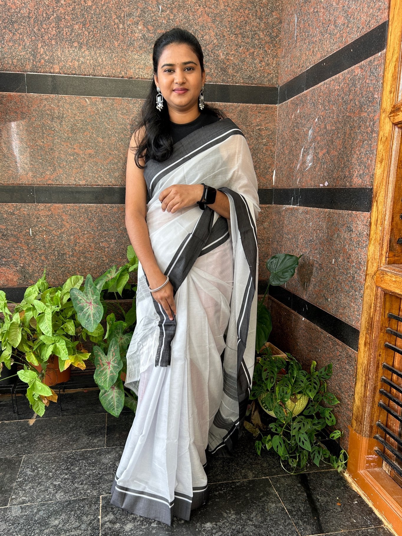 WHITE PATTEDANCHU SAREE.
