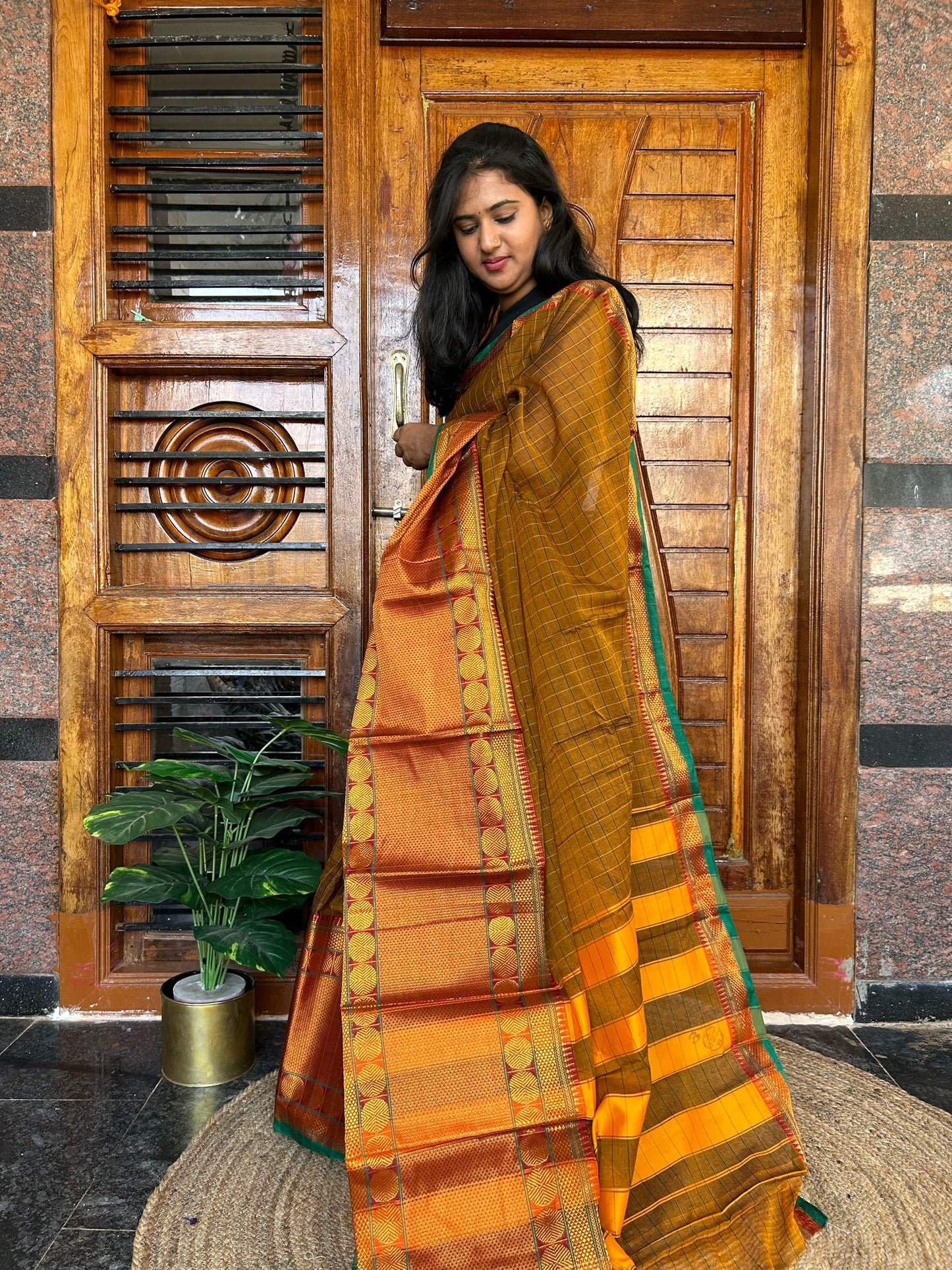 Brown Narayanpet saree.