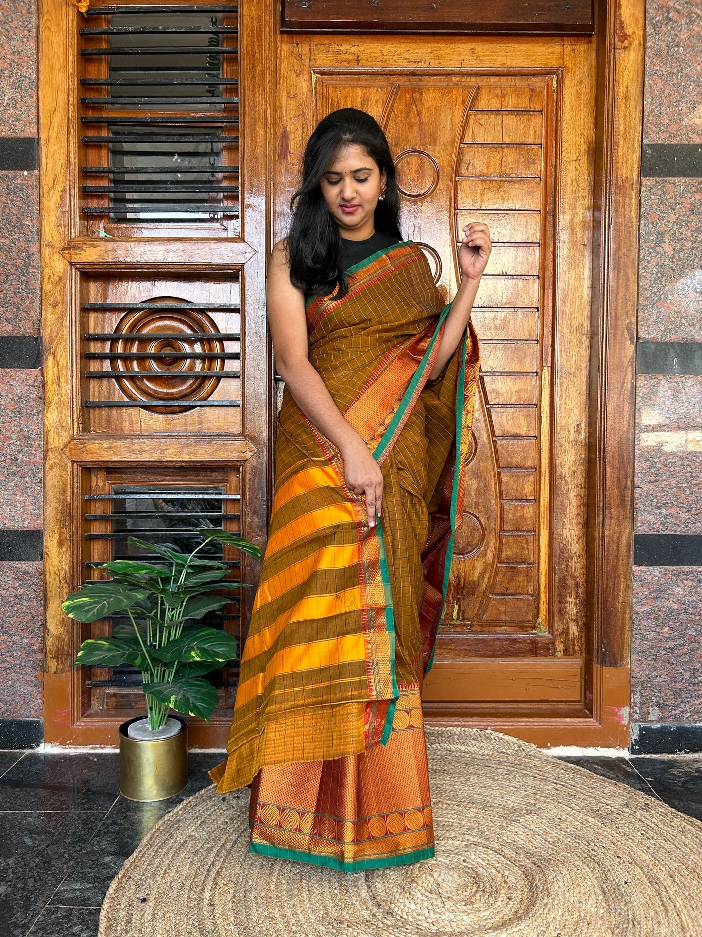 Brown Narayanpet saree.