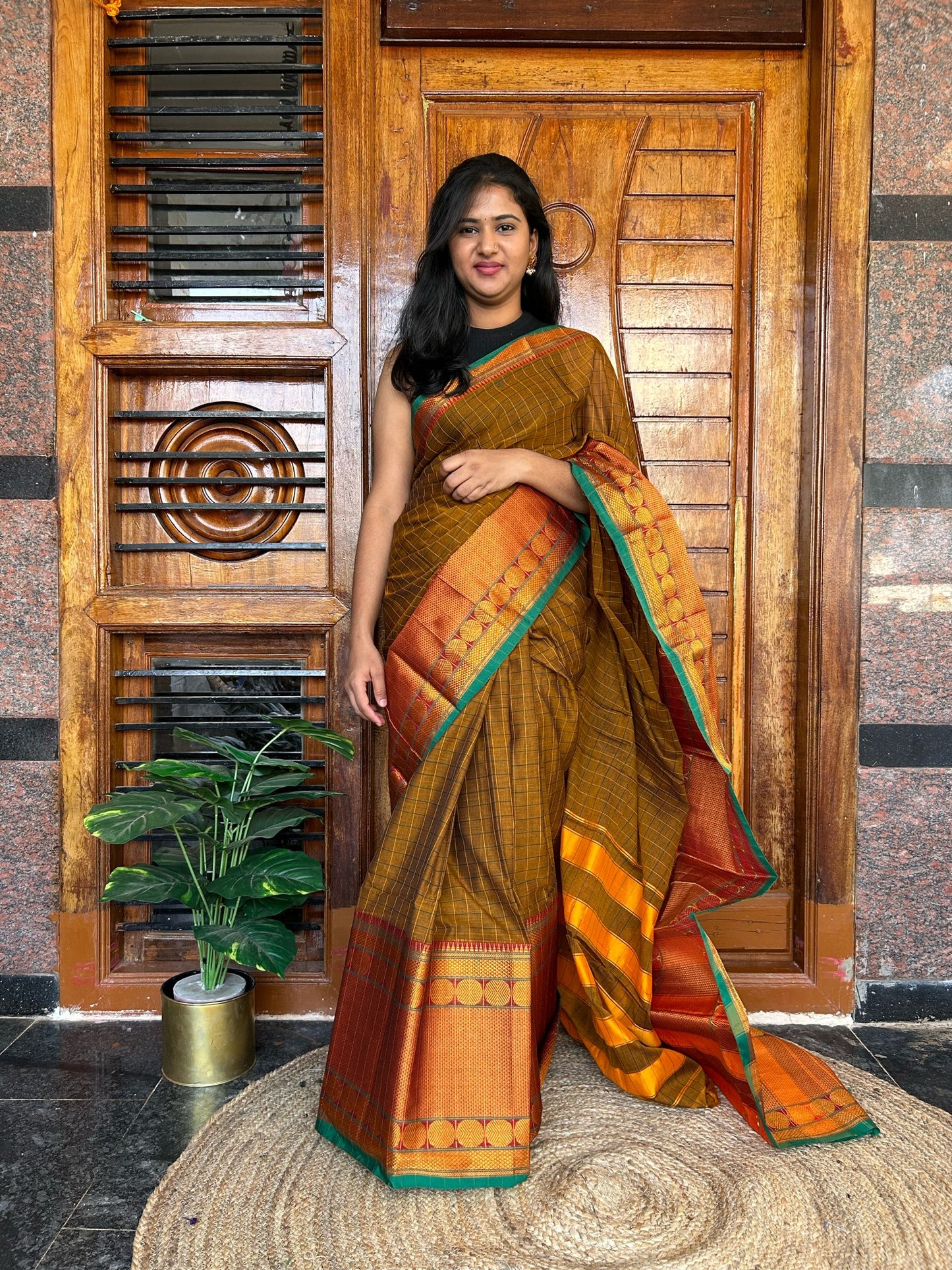 Brown Narayanpet saree.