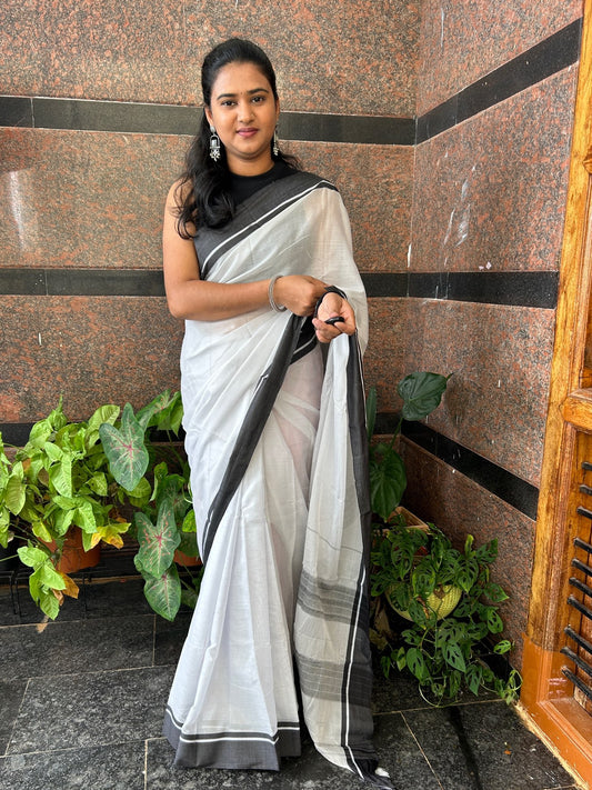 WHITE PATTEDANCHU SAREE.