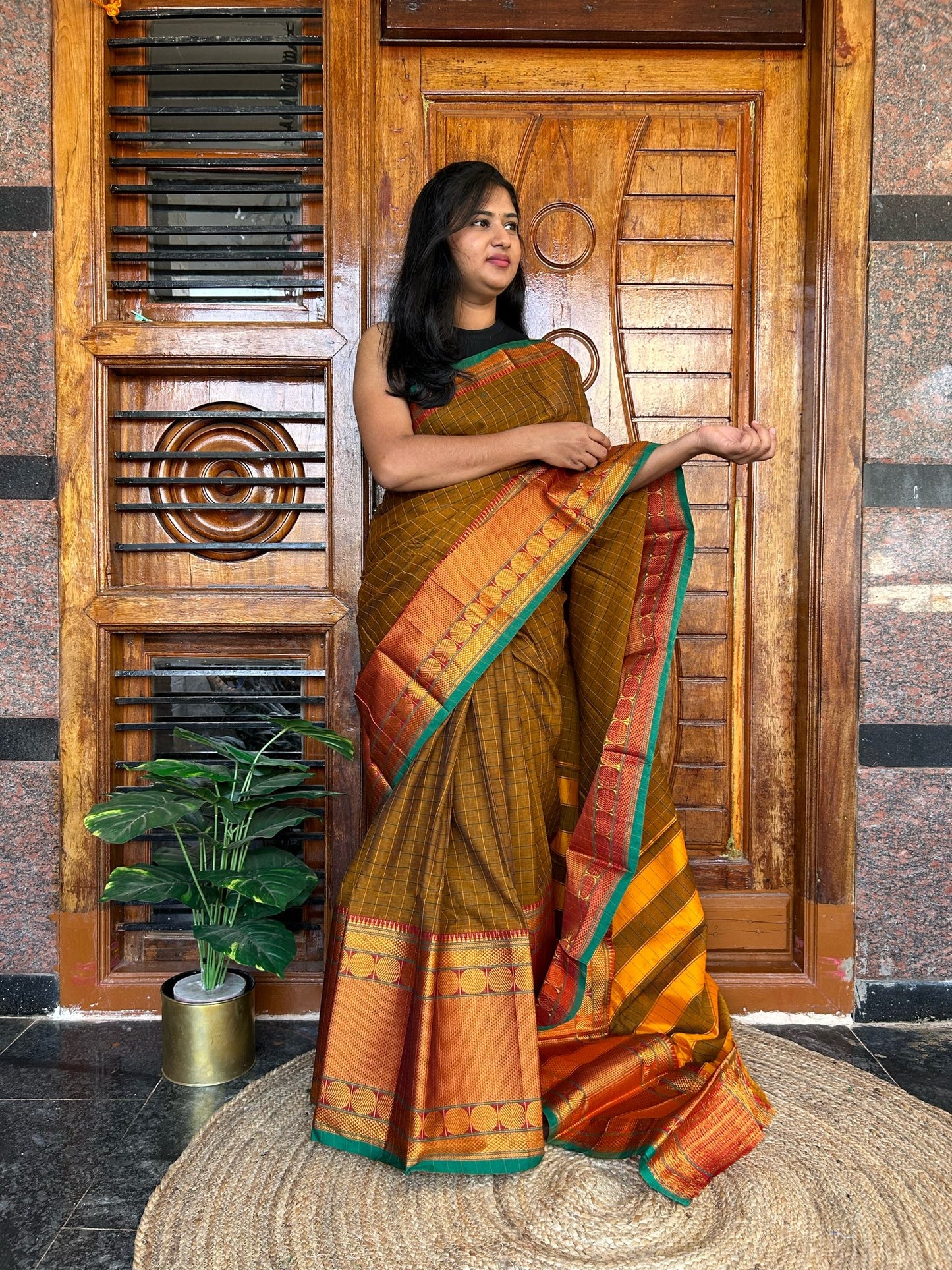 Brown Narayanpet saree.