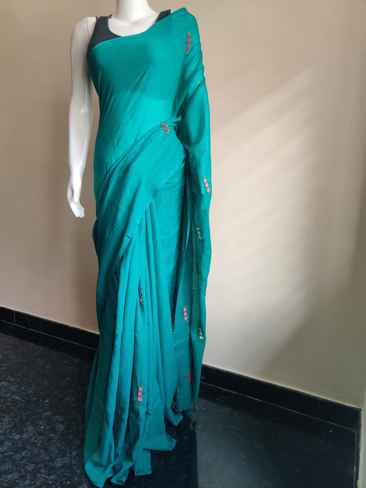 GREEN HAND EMBROIDERED MUL SAREE